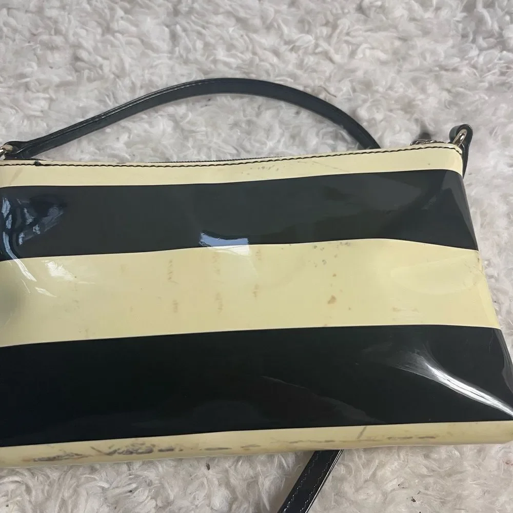 Kate Spade patent Black and Cream Striped small Crossbody Bag.